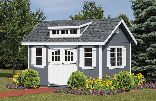 classic series shed surrounded by flowers and bushes