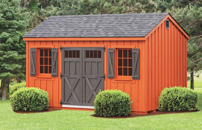 orange and dark grey board and batten shed with double doors in md