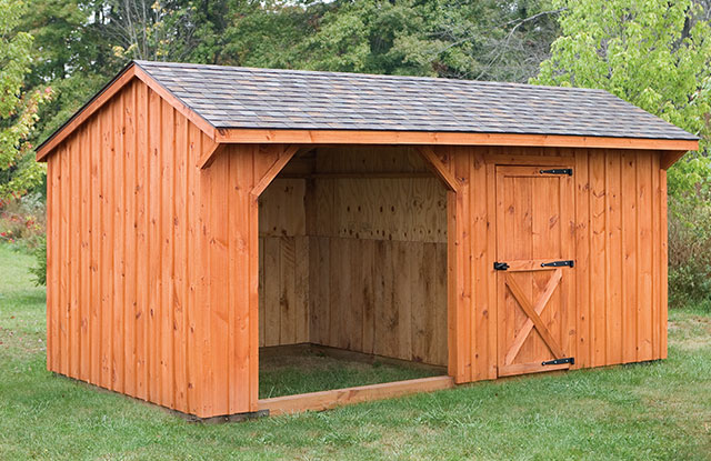 backyard small horse barn with tack area built by amish craftsmen