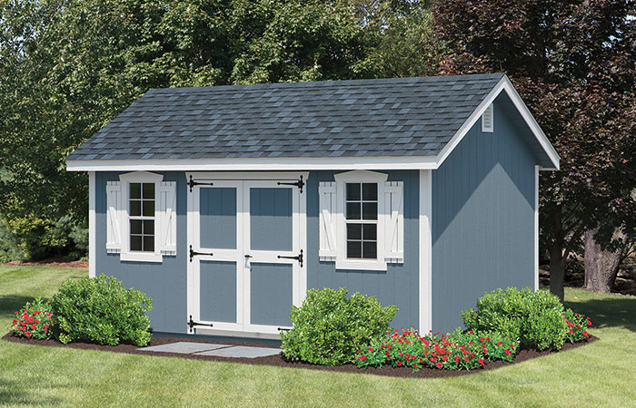 dusty blue lexington storage shed in a garden