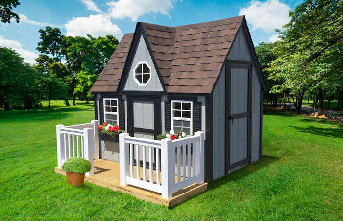 grey victorian backyard playhouse with porch