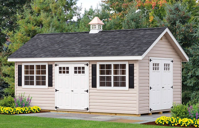 large vinyl a frame beige shed with roof light on top