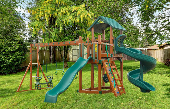 prefab wooden swing set with three swings and two slides for sale in md