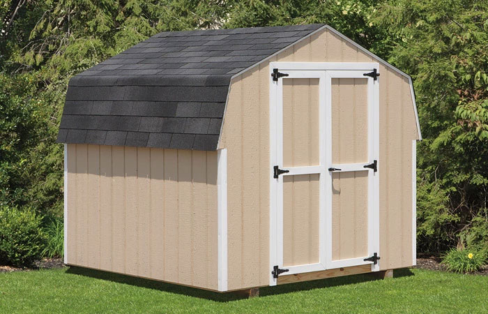 sloped roof on a tan custom keystone storage shed