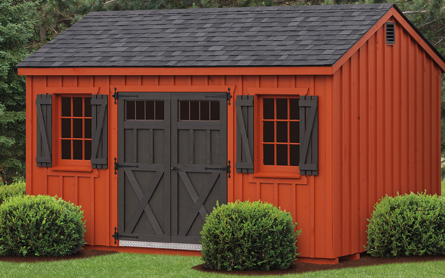 red and black board and batten a frame storage shed