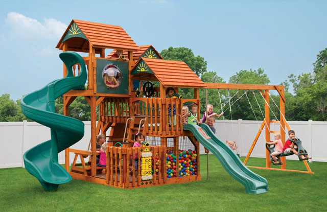 mega swing set with multiple levels and ball pit