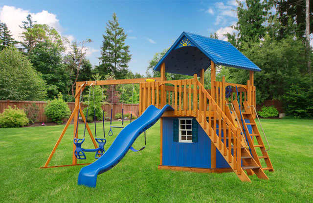 wooden swing set with blue slide in maryland backyard
